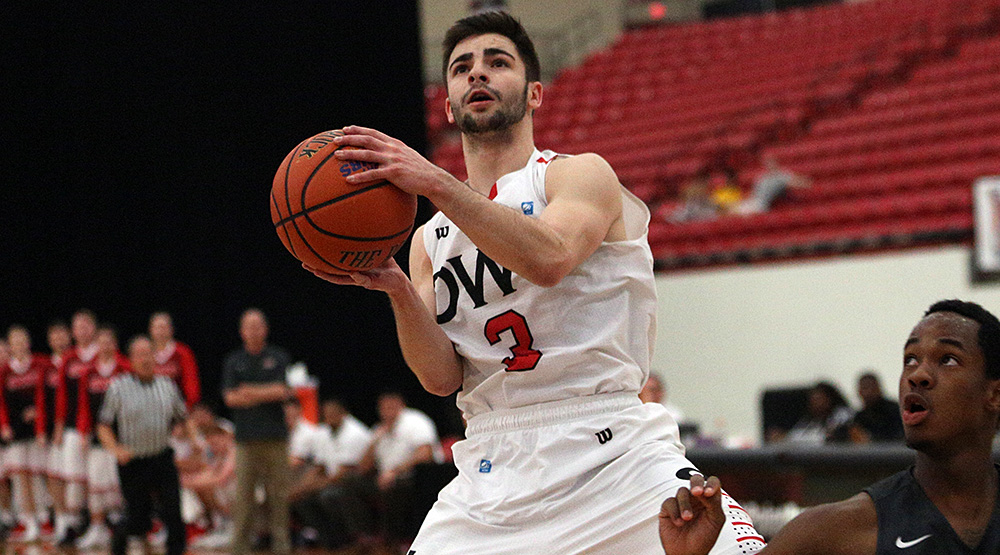 Ohio Wesleyan's Nate Axelrod going in for a layup