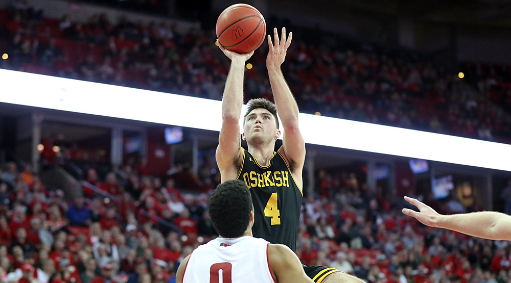 Brett Witchow pulls up for a jumper against Wisconsin (or UW-Madison) in a November exhibition game. (UW-Oshkosh athletics photo)
