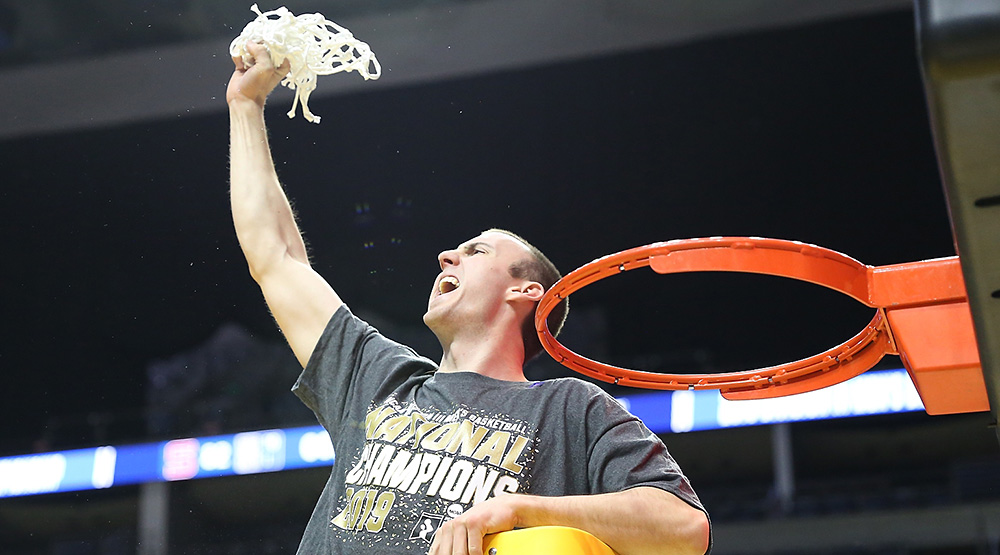 Matt Lewis holds the net aloft before flinging it into the air in Fort Wayne.